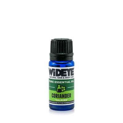 Natural aromatherapy Coriander essential oil in glass bottle by WiDEYE