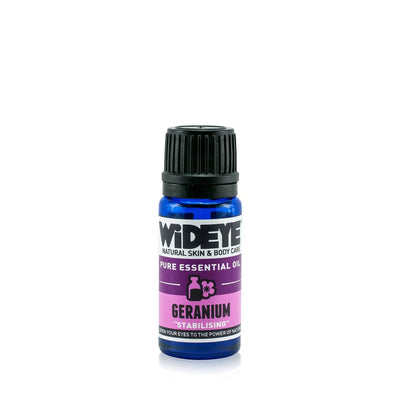 Natural aromatherapy Geranium essential oil in glass bottle by WiDEYE