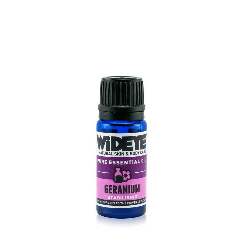 Natural aromatherapy Geranium essential oil in glass bottle by WiDEYE