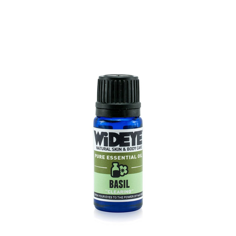 Natural vegan Basil essential oil in glass bottle for aromatherapy.