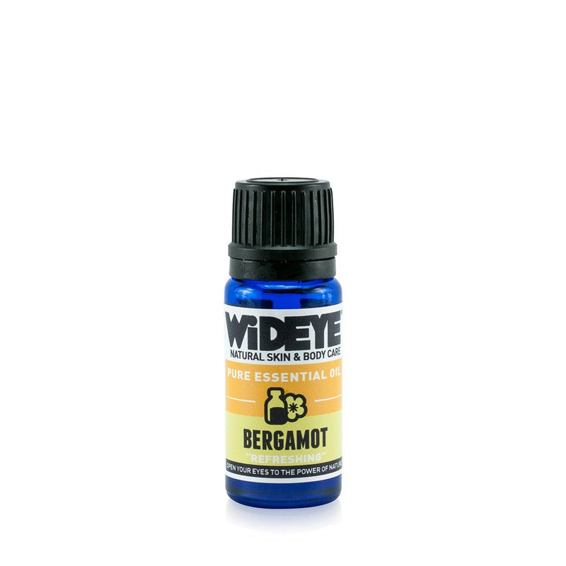 Natural aromatherapy Bergamot essential oil in glass bottle by WiDEYE