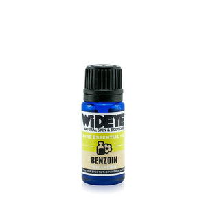 Natural vegan aromatherapy Benzoin essential oil in glass bottle.