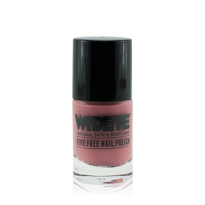 Blush pink nail varnish in glass bottle by WiDEYE.