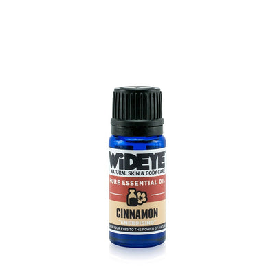Natural aromatherapy Cinnamon essential oil in glass bottle by WiDEYE