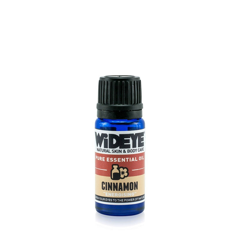 Natural aromatherapy Cinnamon essential oil in glass bottle by WiDEYE