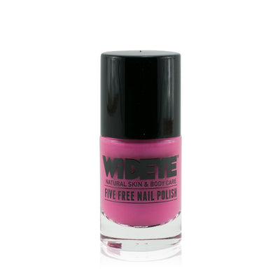 Bright pink nail varnish in glass bottle by WiDEYE