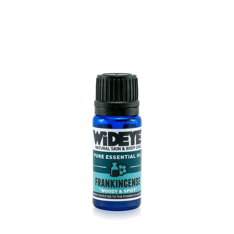 Natural aromatherapy Frankincense essential oil in glass bottle by WiDEYE