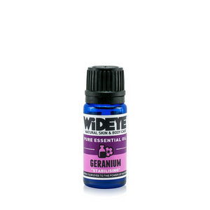 Natural aromatherapy Geranium essential oil in glass bottle by WiDEYE